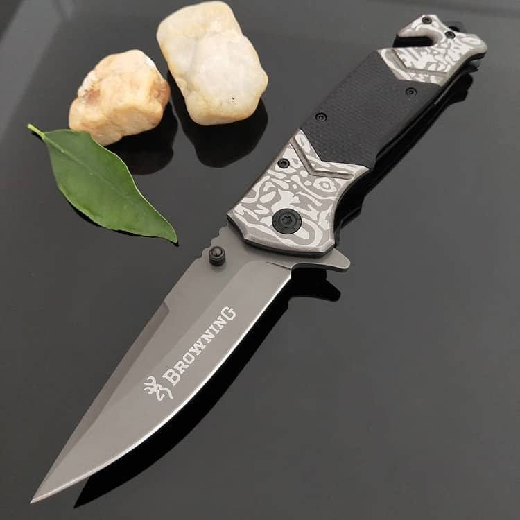 Browning F119 fast opening folding knife with grey Titanium handle
